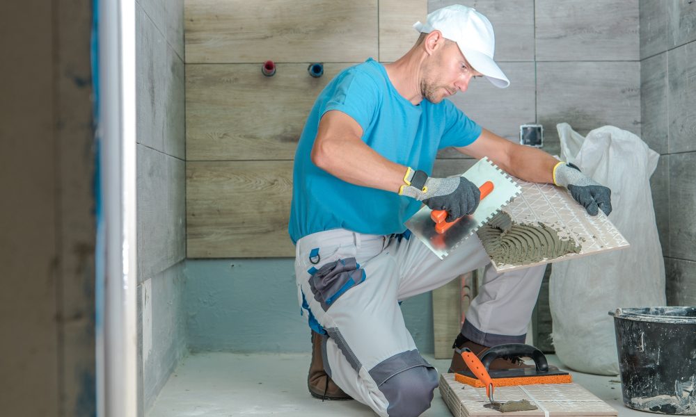 Installing tile for bathroom remodeling in Kansas City